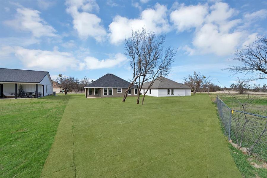 Exterior details and patio area of a home in , Runaway Bay (Image 3). Exterior details and patio area of a home in , Runaway Bay (Image 3).