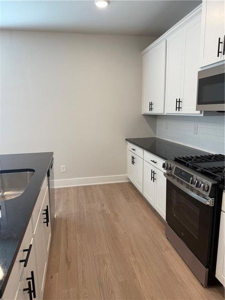 Furnished interior view inside a new home in The Fairways at Mirror Lake, Villa Rica (Image 11).