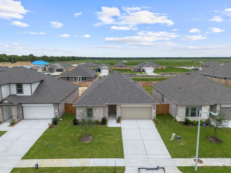 Front exterior of a new home in River Ranch Trails, Dayton, TX, highlighting curb appeal (Image 16). Front exterior of a new home in River Ranch Trails, Dayton, TX, highlighting curb appeal (Image 16).