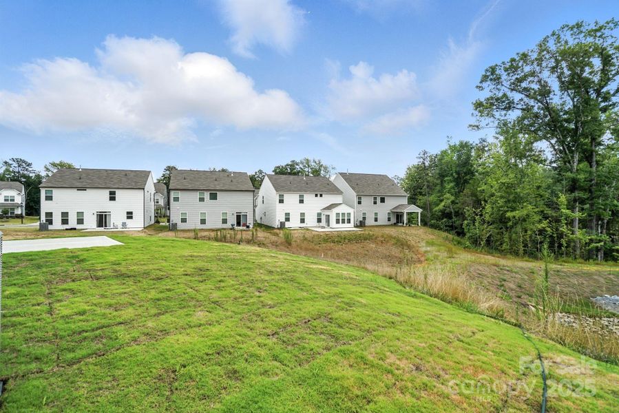 Front exterior of a new home in Hampton Woods, Charlotte, NC, highlighting curb appeal (Image 23).