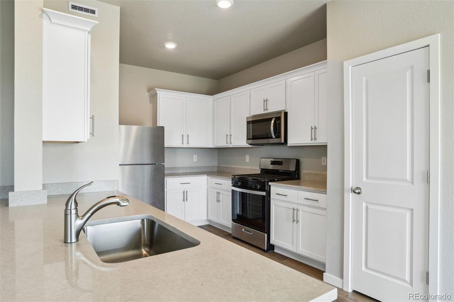 Furnished interior view inside a new home in Bennett Ranch, Bennett (Image 6).