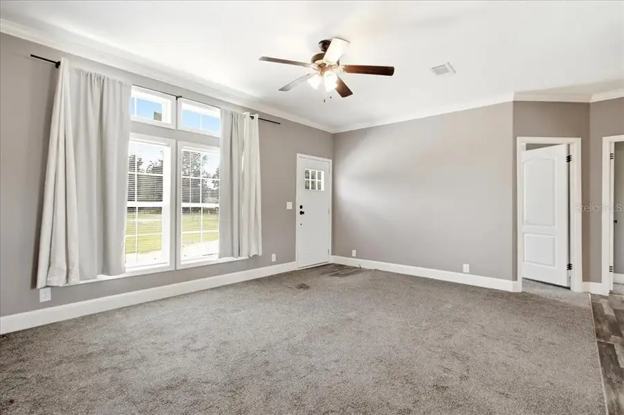 Spacious, unfurnished interior of a new home in , Bushnell (Image 27).