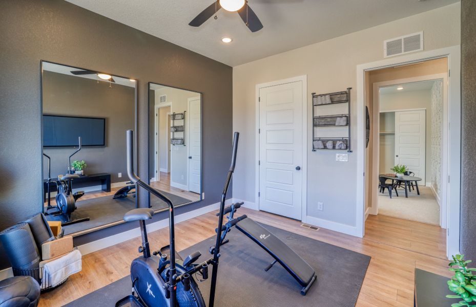 Furnished interior view inside a new home in Hilltop at Inspiration, Aurora (Image 23).
