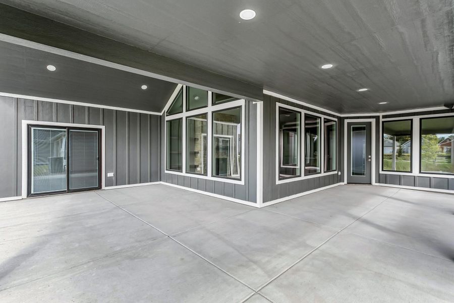 Exterior details and patio area of a home in The Courtyards at The Heritage, Andover (Image 3).