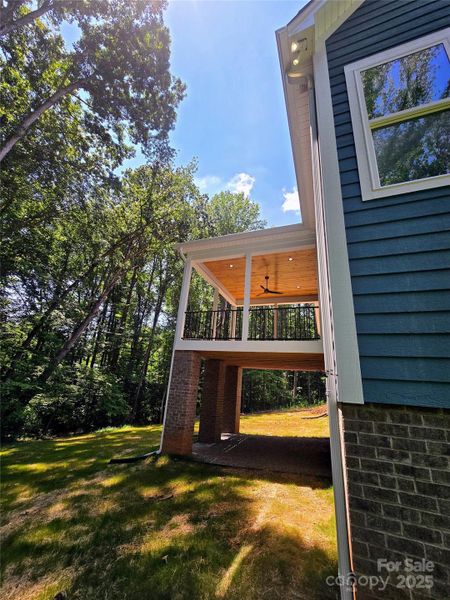 Exterior details and patio area of a home in , Belmont (Image 3).
