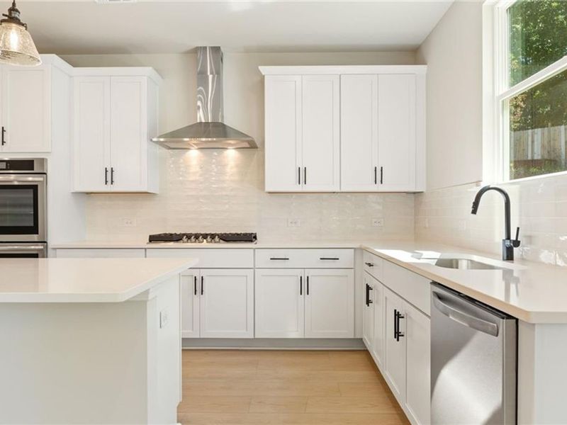 Furnished interior view inside a new home in Melody Lakeside Estates, Buford (Image 4).