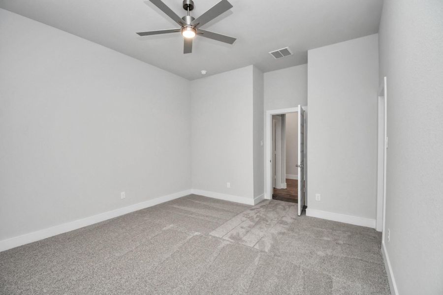 Generously sized secondary bedrooms featuring spacious closets, soft and inviting carpeting underfoot, large windows allowing plenty of natural light, and the added touch of privacy blinds for your personal retreat. Sample photo of completed home with similar floor plan. Actual colors and selections may vary. Generously sized secondary bedrooms featuring spacious closets, soft and inviting carpeting underfoot, large windows allowing plenty of natural light, and the added touch of privacy blinds for your personal retreat. Sample photo of completed home with similar floor plan. Actual colors and selections may vary.