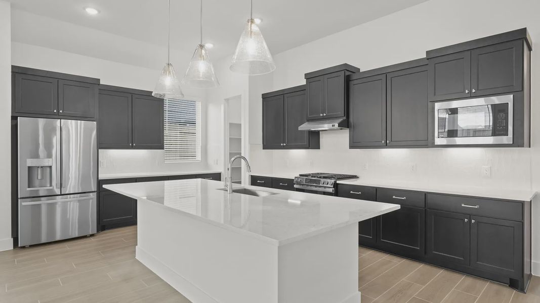 Furnished interior view inside a new home in Sienna 45', Missouri City (Image 8).