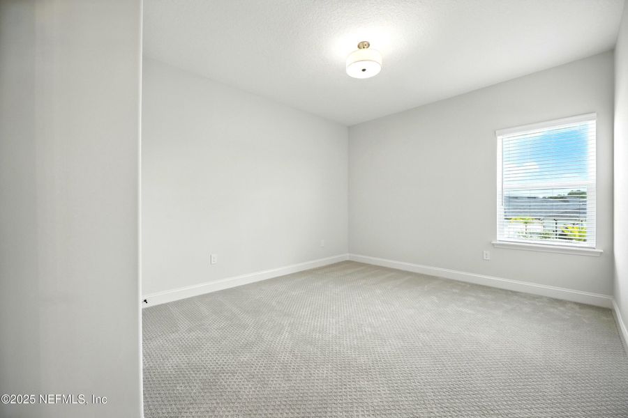 Spacious, unfurnished interior of a new home in Silver Landing At Silverleaf, St. Augustine (Image 21).