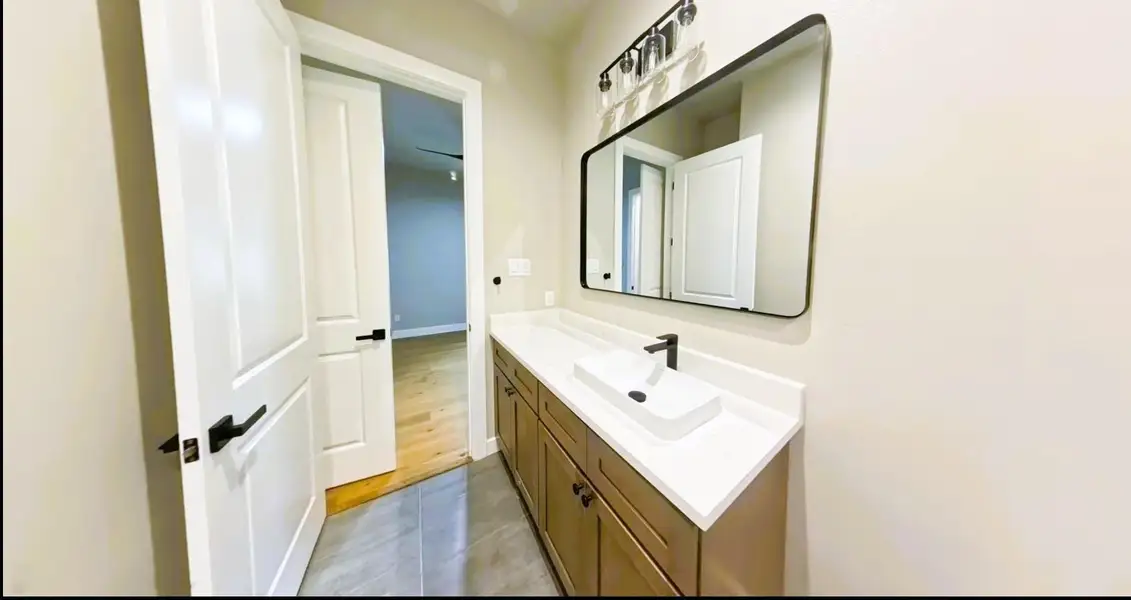 Furnished interior view inside a new home in , Conroe (Image 14).