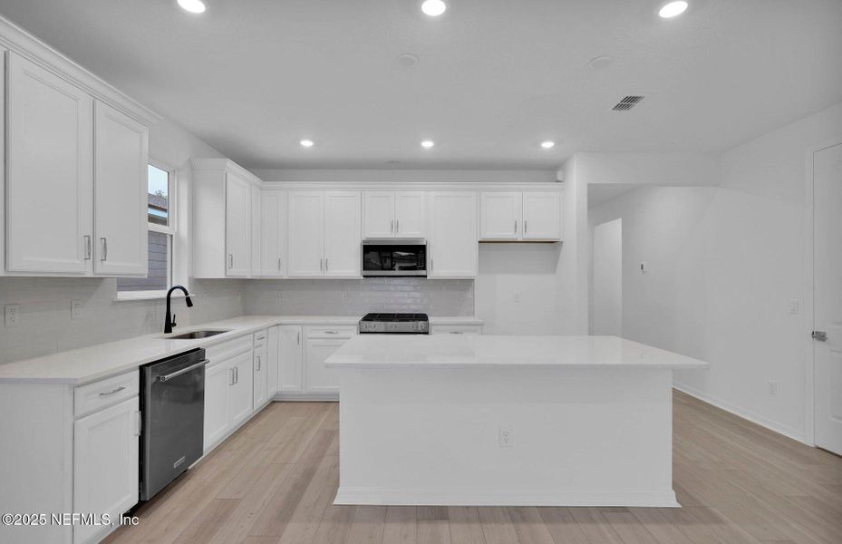 Furnished interior view inside a new home in Double Branch, Middleburg (Image 4). Furnished interior view inside a new home in Double Branch, Middleburg (Image 4).
