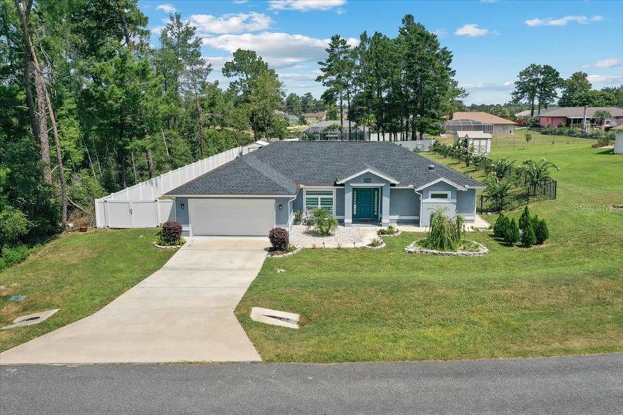 Front exterior of a new home in , Ocala, FL, highlighting curb appeal (Image 26). Front exterior of a new home in , Ocala, FL, highlighting curb appeal (Image 26).