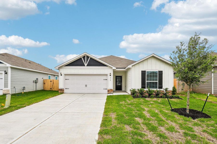 Front exterior of a new home in Trails at Cochran Ranch, Waller, TX, highlighting curb appeal (Image 17).