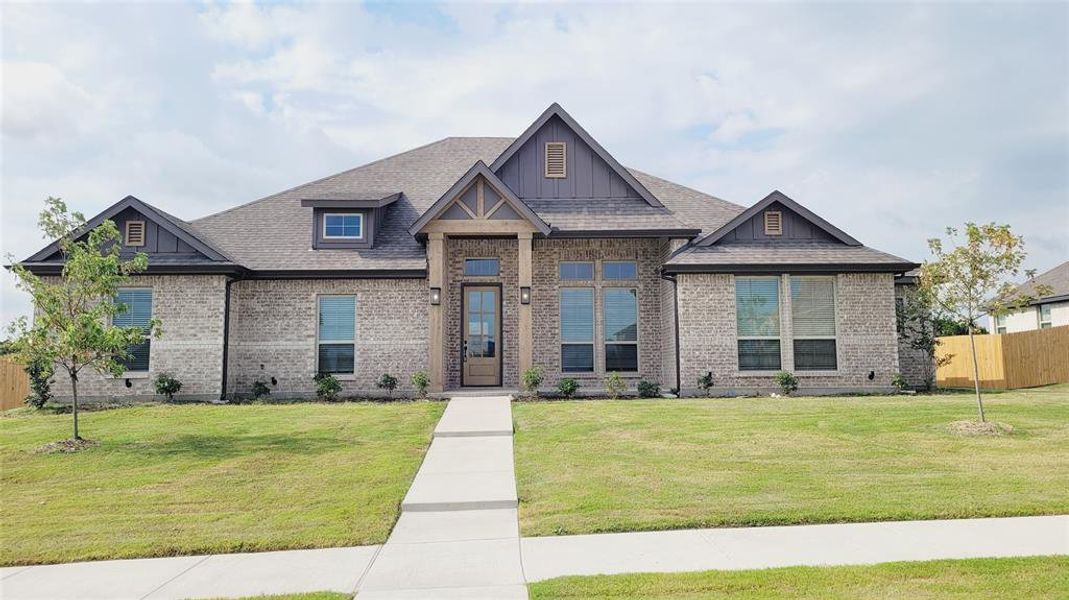 Front exterior of a new home in , DeSoto, TX, highlighting curb appeal (Image 18).