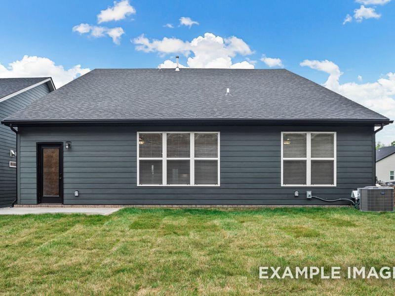 Exterior details and patio area of a home in Woods Crossing, Gallatin (Image 31).
