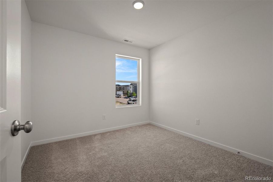 Spacious, unfurnished interior of a new home in Revel Crossing at Wolf Ranch – The Ascent Collection, Colorado Springs (Image 17).