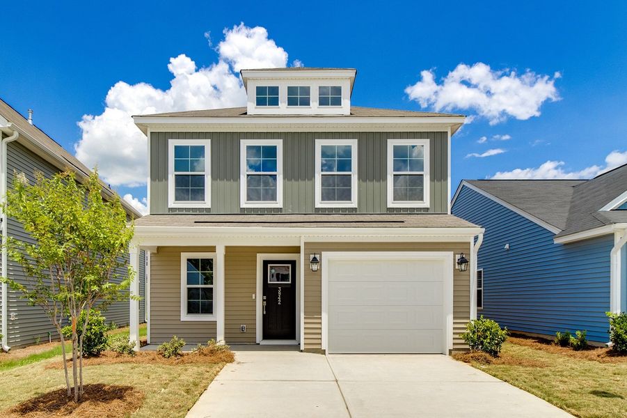 Front exterior of a new home in Bluefield, Lexington, SC, highlighting curb appeal (Image 1). Front exterior of a new home in Bluefield, Lexington, SC, highlighting curb appeal (Image 1).