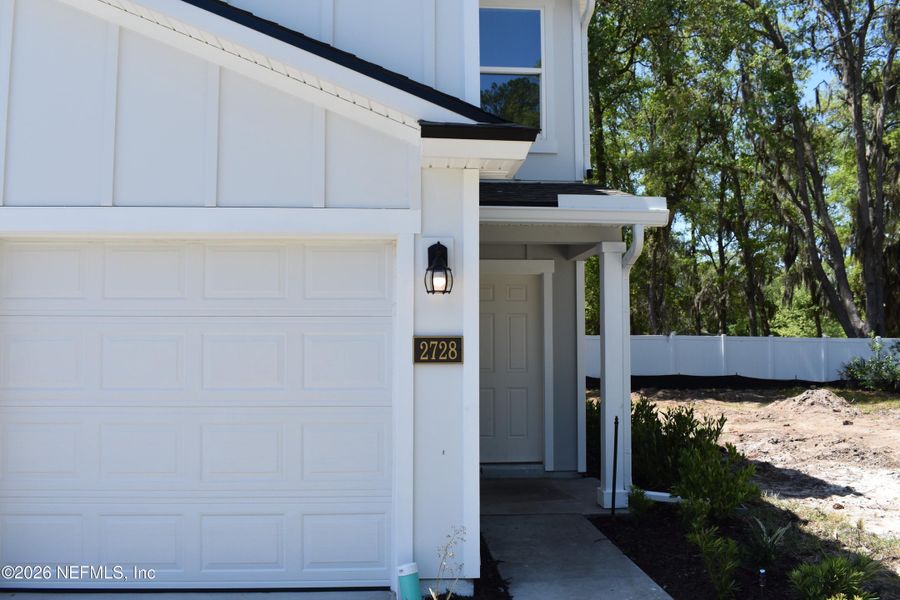 Exterior details and patio area of a home in Irongate Villas, Jacksonville (Image 3).