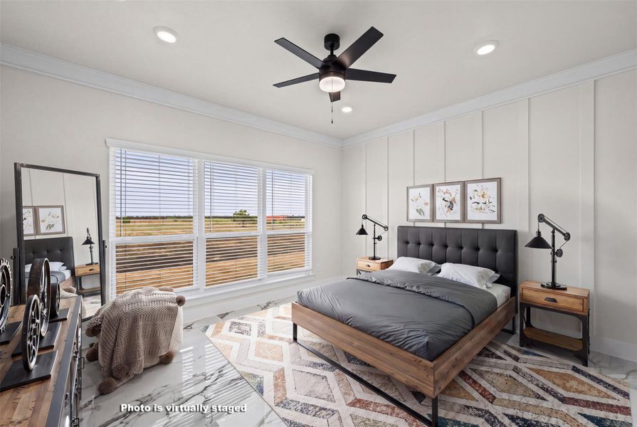 High ceilings, board and batten details, and polished tile floors define this elegant bedroom.