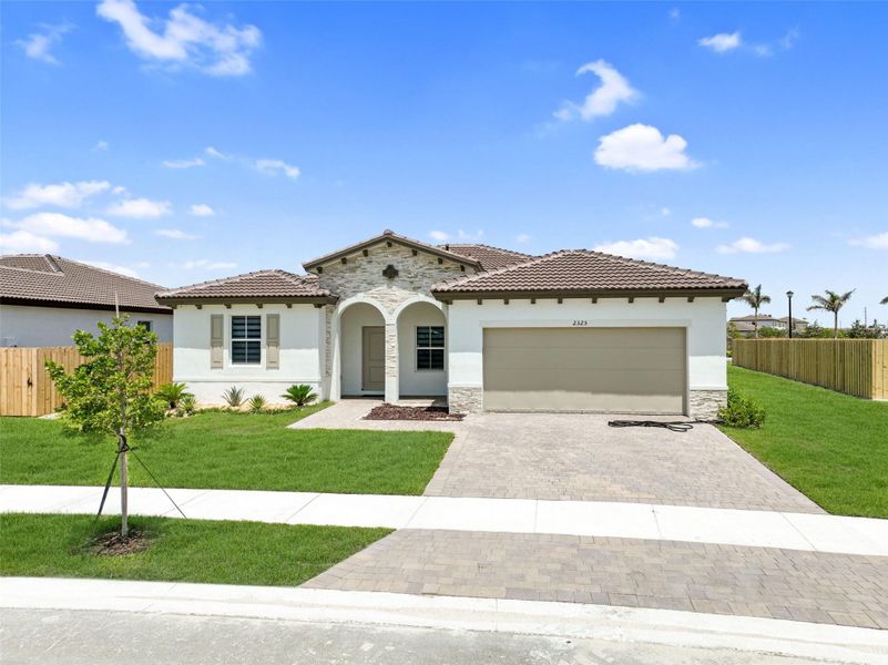 Front exterior of a new home in , Homestead, FL, highlighting curb appeal (Image 18).