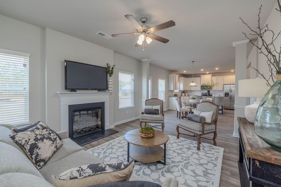 Family room with fireplace and lots of natural light