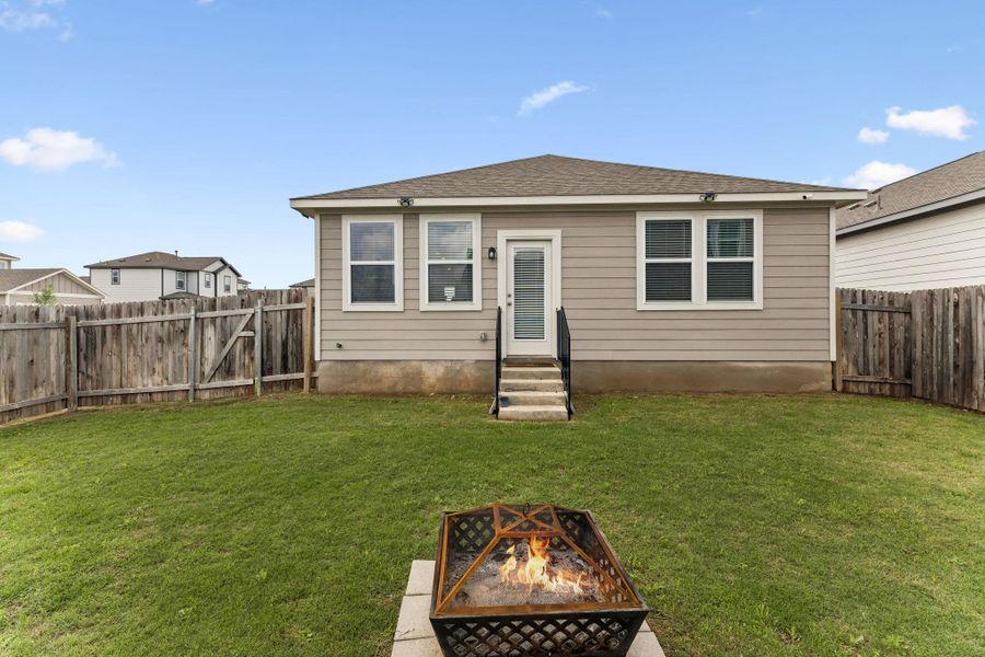 Exterior details and patio area of a home in Stallion Run, Buda (Image 19).