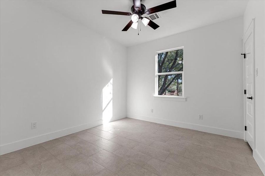 Bedroom 2 featuring ceiling fan