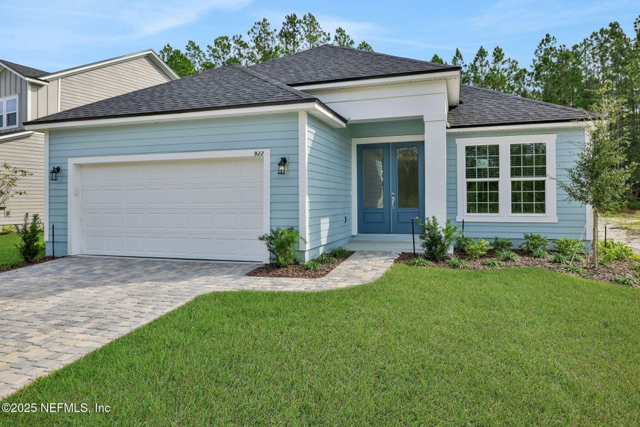 Front exterior of a new home in Brook Forest, St. Augustine, FL, highlighting curb appeal (Image 21).