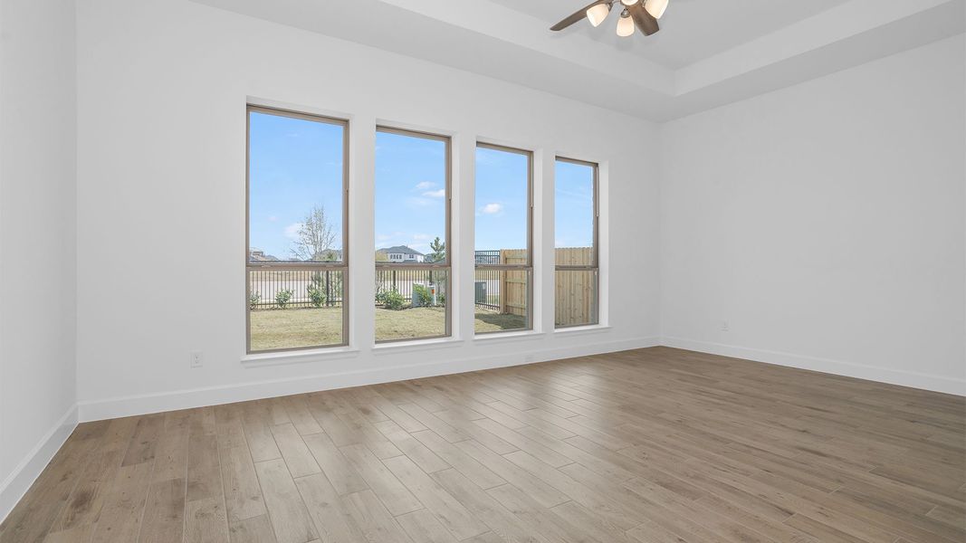 Representative unfurnished interior of a home built from the 3896W by Perry Homes in Terraces, Rockwall (Image 7).