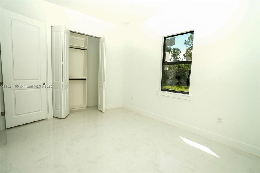 Spacious, unfurnished interior of a new home in , Lehigh Acres (Image 21).