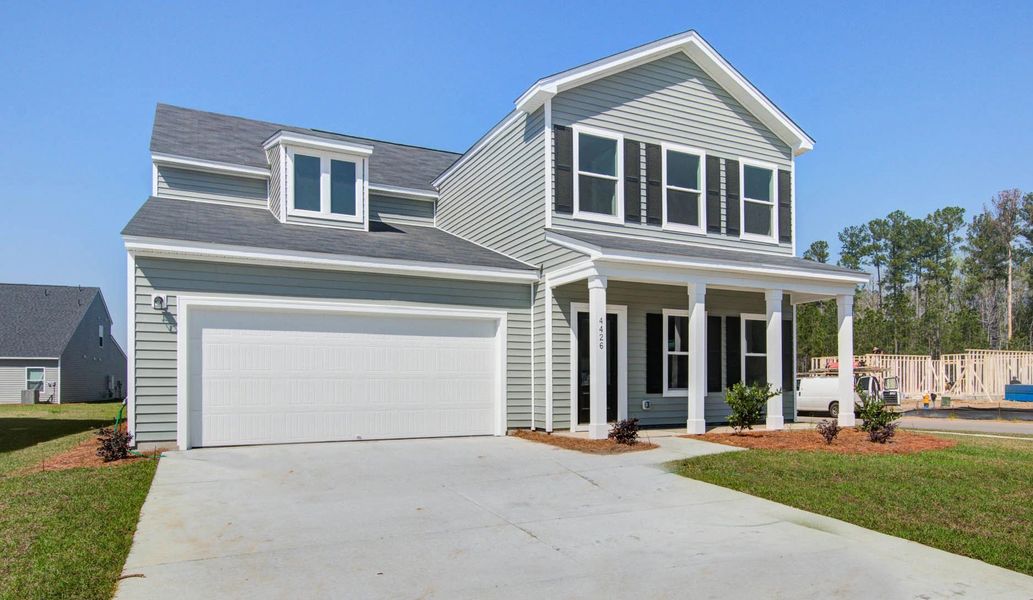 Representative exterior photo of a completed home built from the Harrison by Ashton Woods in Watson Hill, Summerville, SC (Image 25).