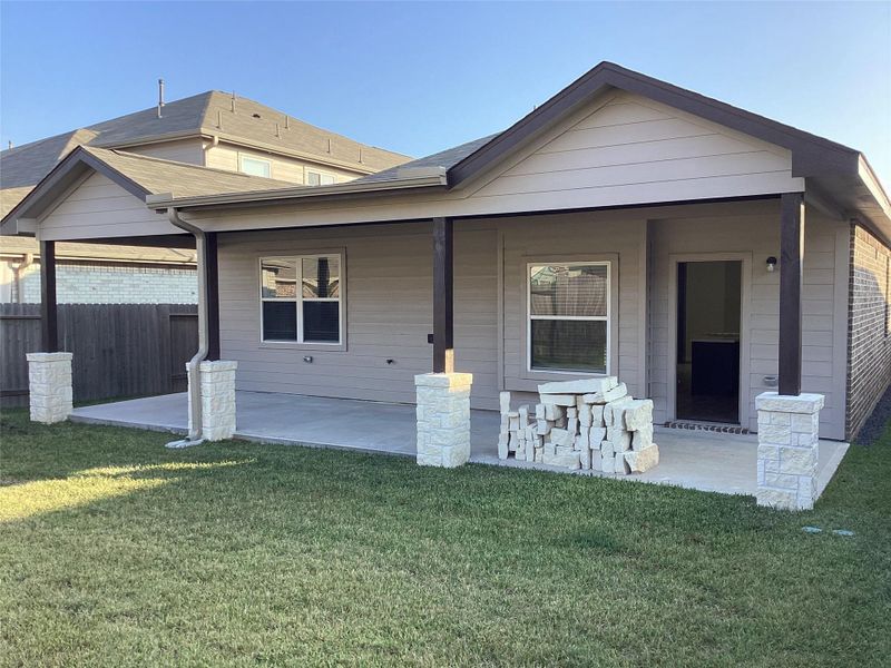 Exterior details and patio area of a home in Willow Trace 45' at Willow Trace, Spring (Image 16).