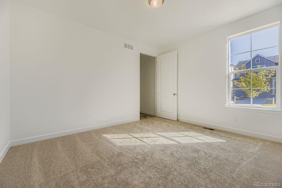 Spacious, unfurnished interior of a new home in Newlin Crossing: The Monarch Collection, Parker (Image 20). Spacious, unfurnished interior of a new home in Newlin Crossing: The Monarch Collection, Parker (Image 20).