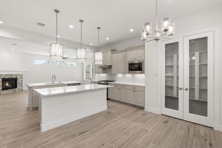 Furnished interior view inside a new home in The Trails, New Caney (Image 6).
