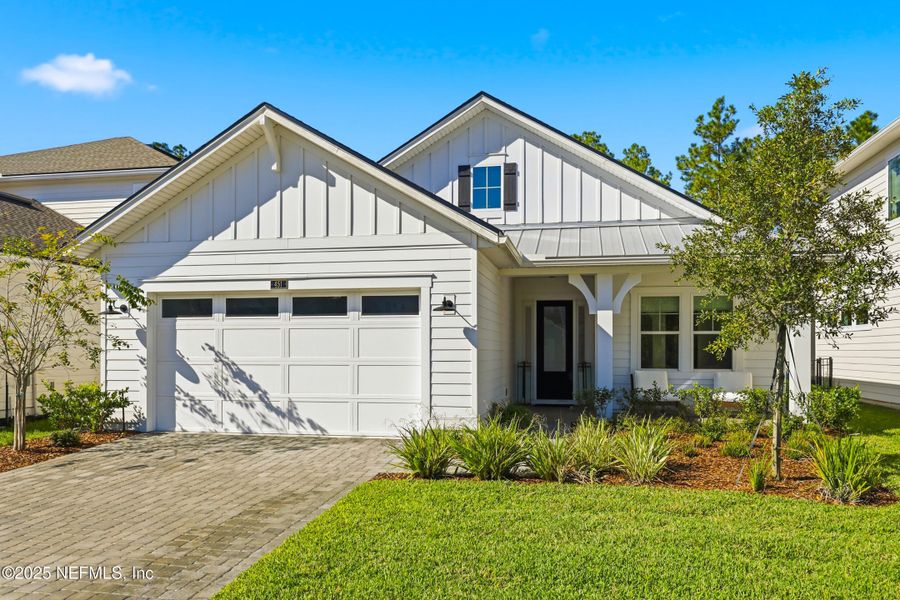 Front exterior of a new home in , Ponte Vedra, FL, highlighting curb appeal (Image 2).