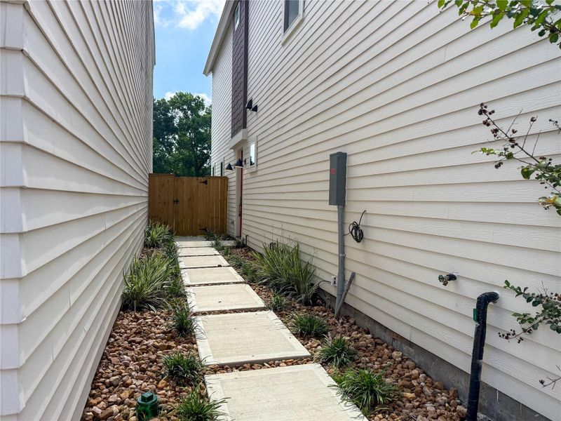 Exterior details and patio area of a home in Rachel Landing, Houston (Image 15). Exterior details and patio area of a home in Rachel Landing, Houston (Image 15).