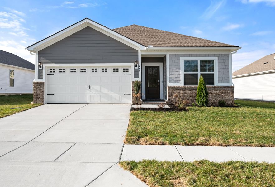 Front exterior of a new home in Spring Valley Estates: Grandview Collection, Lewisburg, TN, highlighting curb appeal (Image 1). Front exterior of a new home in Spring Valley Estates: Grandview Collection, Lewisburg, TN, highlighting curb appeal (Image 1).
