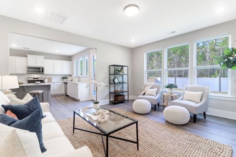 Representative furnished interior of a home built from the Inverness P by True Homes in Homecoming, Ravenel (Image 8).
