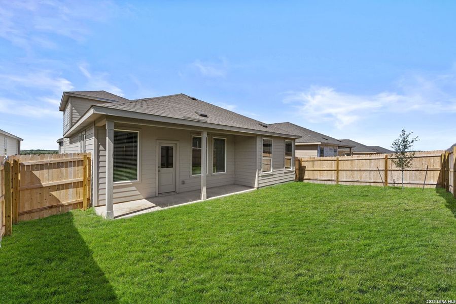 Exterior details and patio area of a home in Sky Ranch, New Braunfels (Image 2).