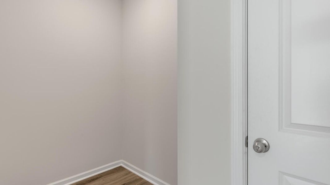 Spacious, unfurnished interior of a new home in The Haven at Indigo Preserve, Leland (Image 26).