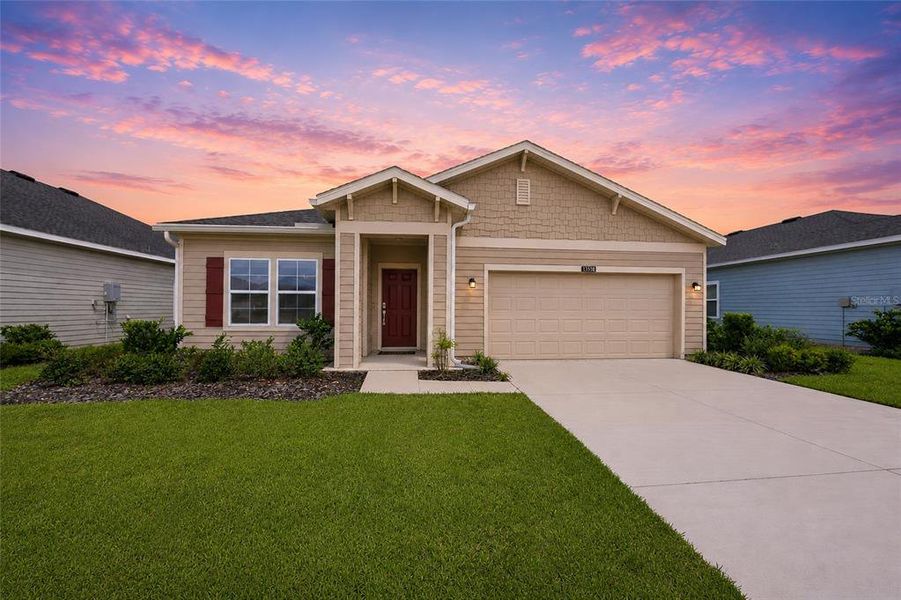 Front exterior of a new home in , Alachua, FL, highlighting curb appeal (Image 26). Front exterior of a new home in , Alachua, FL, highlighting curb appeal (Image 26).