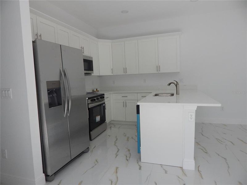 Furnished interior view inside a new home in , Tampa (Image 6).