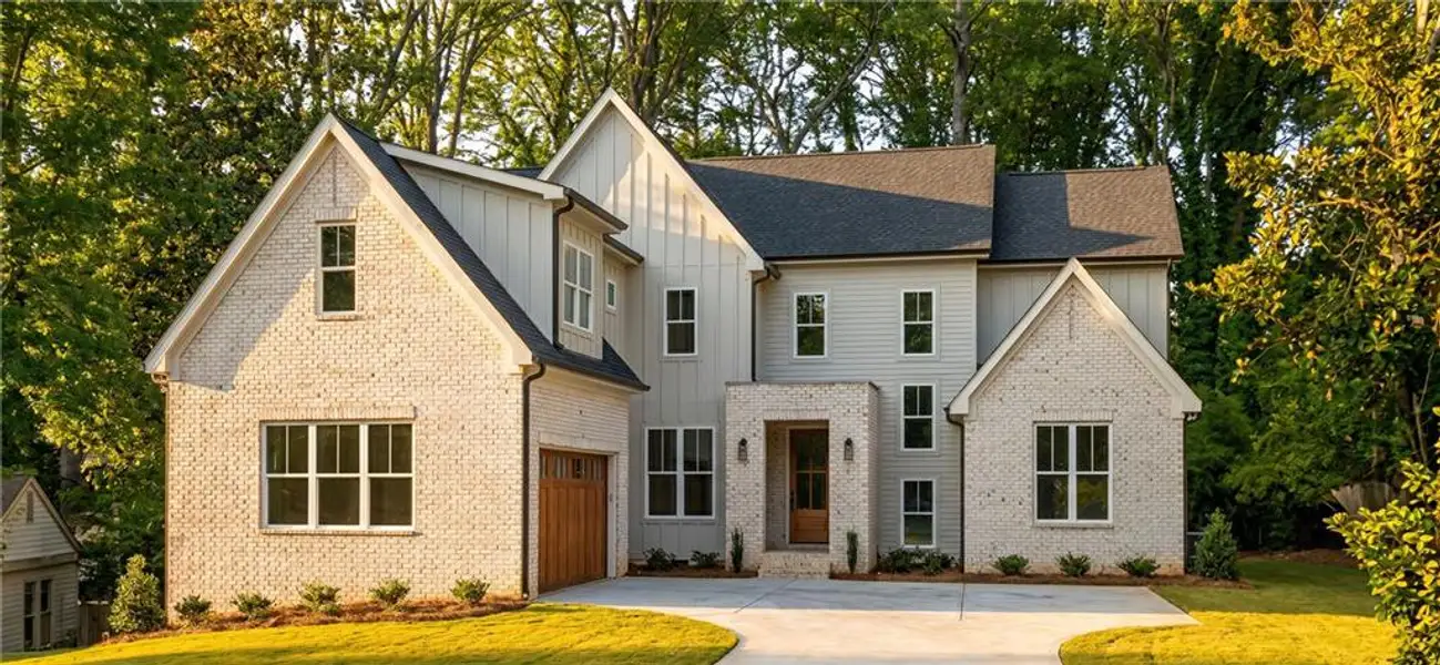 Front exterior of a new home in , Buford, GA, highlighting curb appeal (Image 2). Front exterior of a new home in , Buford, GA, highlighting curb appeal (Image 2).