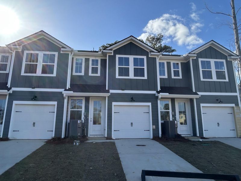 Front exterior of a new home in , Summerville, SC, highlighting curb appeal (Image 15).