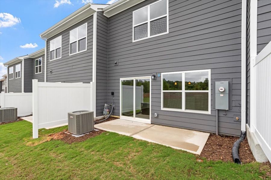 Exterior details and patio area of a home in Sweetbrier, Durham (Image 4).