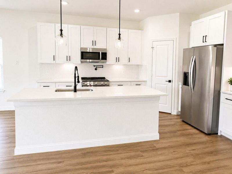 Furnished interior view inside a new home in Spring Branch Crossing, Conroe (Image 3).