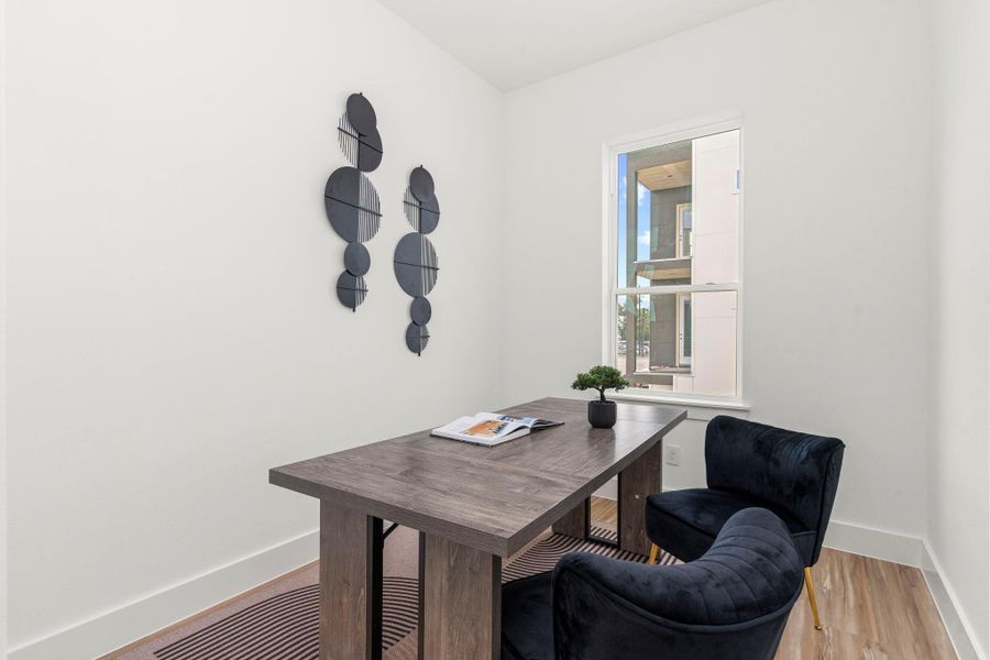 Designed to inspire focus and productivity, this flexible workspace is virtually staged to highlight its potential for remote work, study, or creative projects.