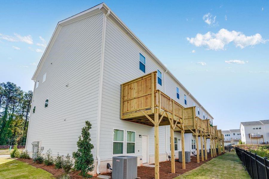 Exterior details and patio area of a home in Chandler Run, Tucker (Image 24). Exterior details and patio area of a home in Chandler Run, Tucker (Image 24).