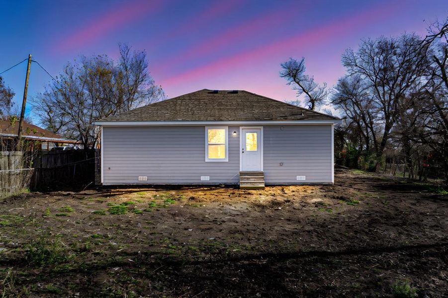 View of back house at dusk