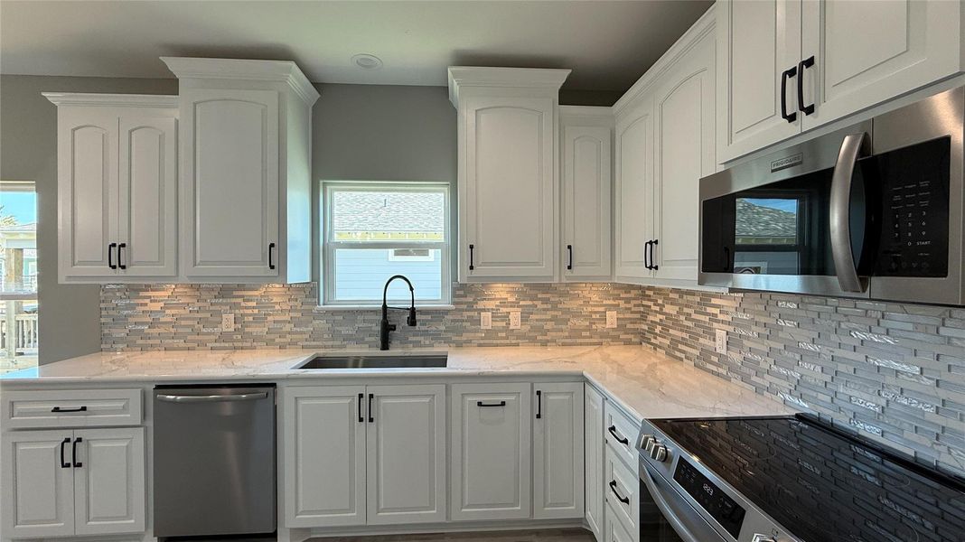 Furnished interior view inside a new home in , Bolivar Peninsula (Image 11).
